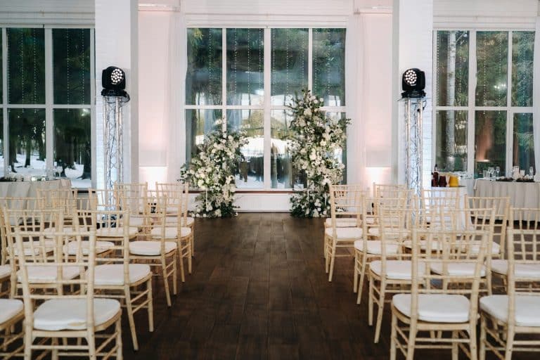 A place for a wedding ceremony in the interior. Decorated wedding venue